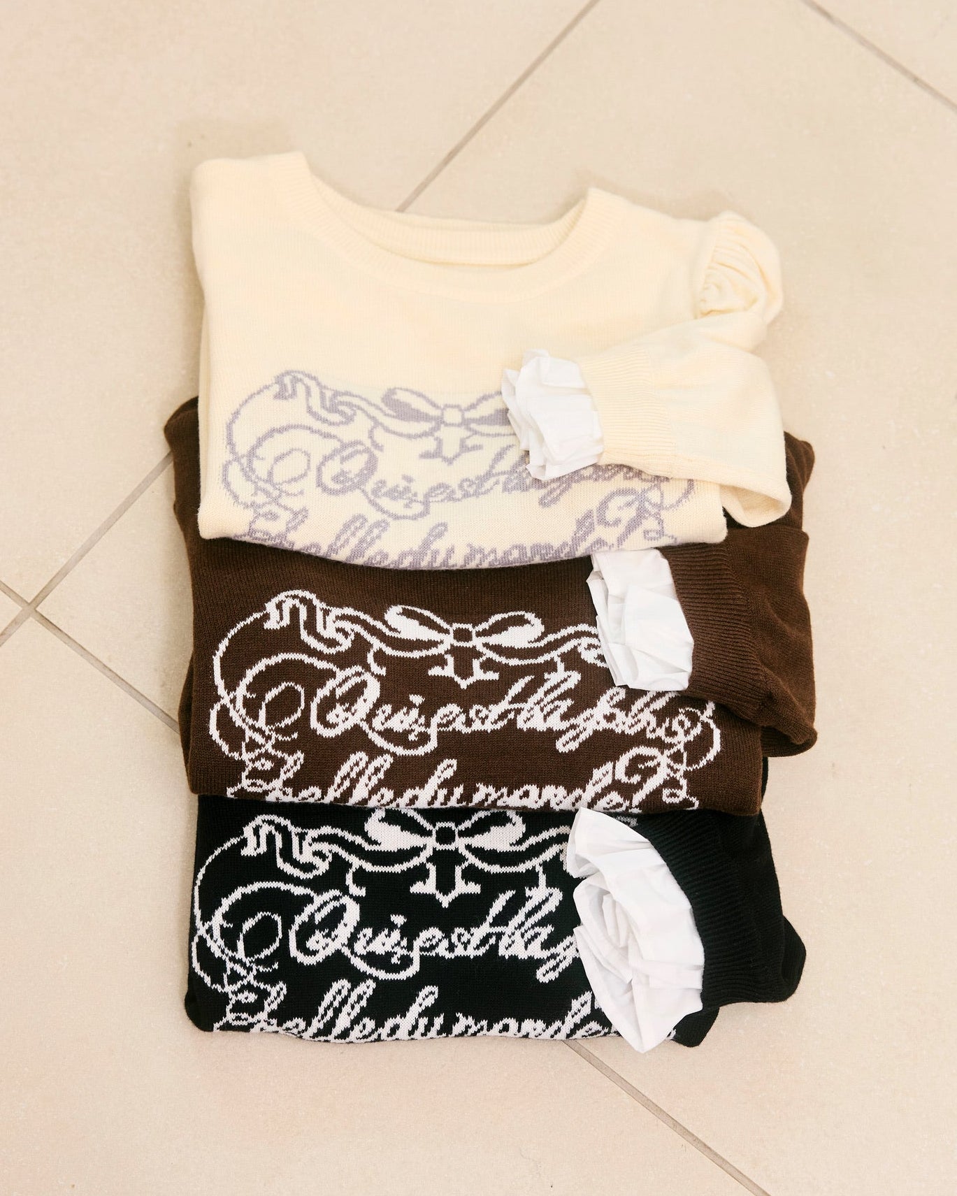 message logo knit tops