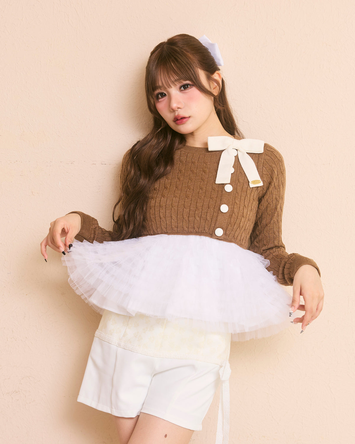 plume peplum ribbon knit