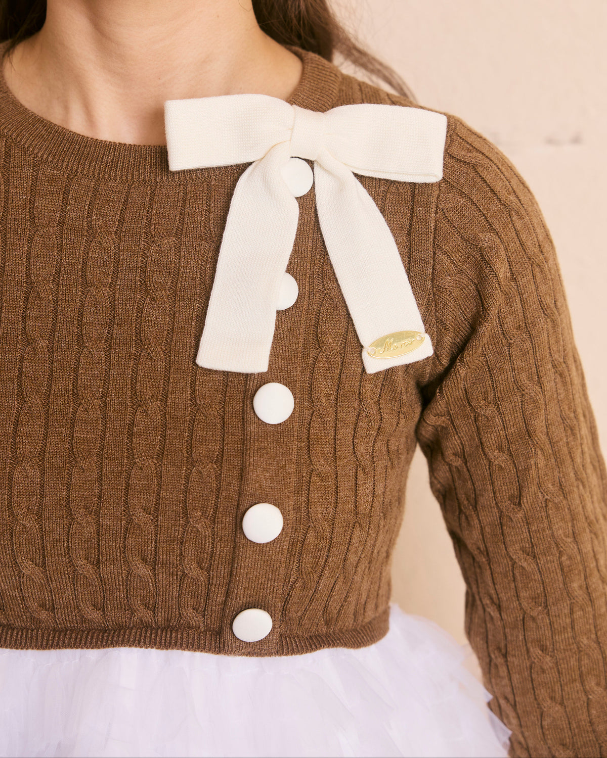 plume peplum ribbon knit