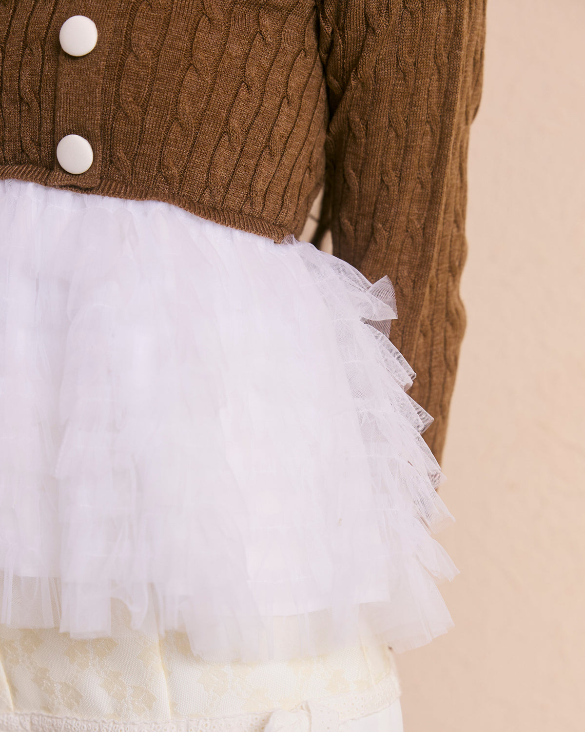 plume peplum ribbon knit