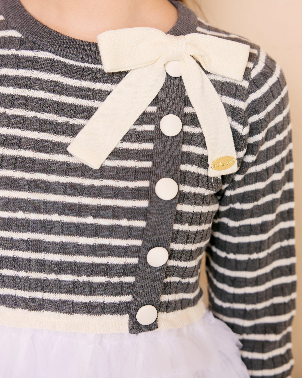 plume peplum ribbon knit